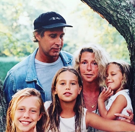 A picture of Emily Evelyn Chase and her sisters with her parents.